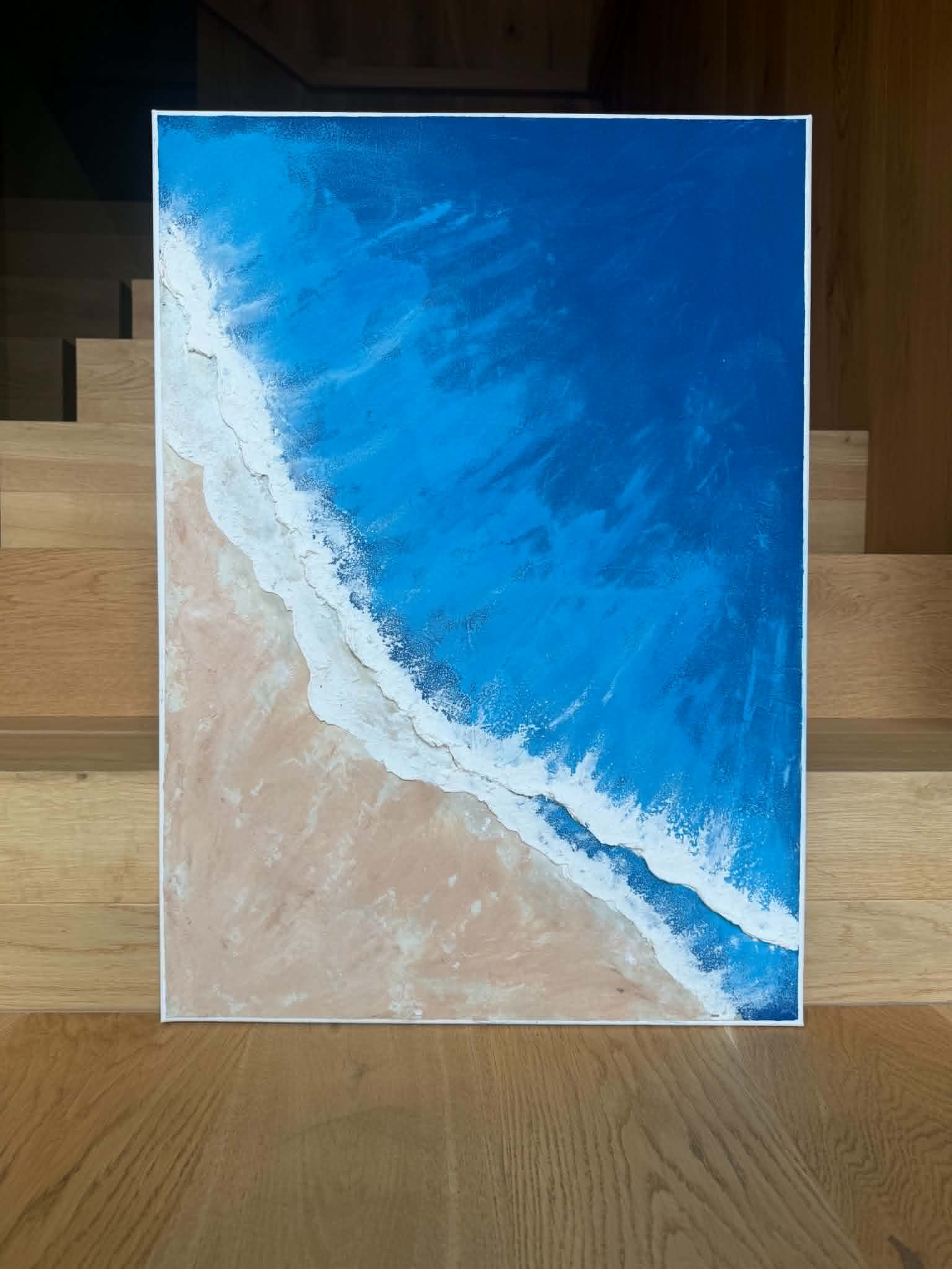 Struktuurne akrüülmaal lõuendpapil "Sandy Beach". Kujutatud sinist vett, pruuni liivaranda ja ühte valget vahust veeriba - the flos edit.